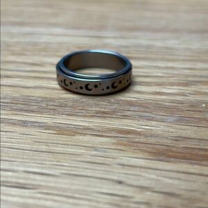 Stainless steel fidget ring with moons and stars
